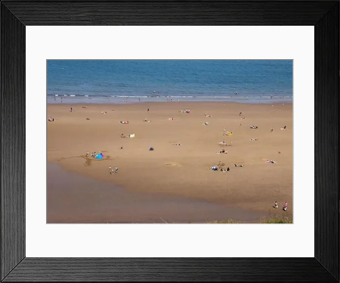 Framed Print : Aerial photo of the beautiful town of Whitby in the UK in North Yorkshire in the UK showing people on the sandy beach Framed Print : Aerial photo of the beautiful town of Whitby in the UK in North Yorkshire in the UK showing people on the sandy beach