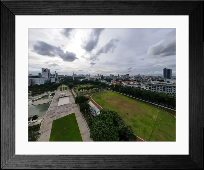 Framed Print : Aerial view of West Irian Liberation monument in downtown Jakarta and noise cloud with Jakarta cityscape Framed Print : Aerial view of West Irian Liberation monument in downtown Jakarta and noise cloud with Jakarta cityscape