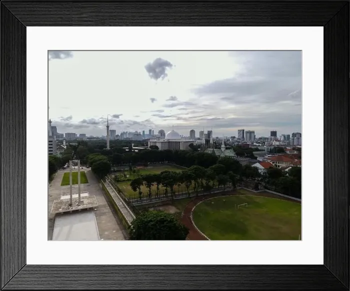 Framed Print : Aerial view of West Irian Liberation monument in downtown Jakarta and noise cloud with Jakarta cityscape Framed Print : Aerial view of West Irian Liberation monument in downtown Jakarta and noise cloud with Jakarta cityscape
