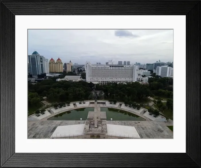 Framed Print : Aerial view of West Irian Liberation monument in downtown Jakarta and noise cloud with Jakarta cityscape Framed Print : Aerial view of West Irian Liberation monument in downtown Jakarta and noise cloud with Jakarta cityscape