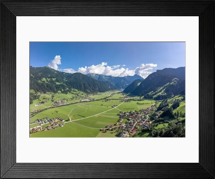 Framed Print : Aerial drone shot of Zillertal valley with clouds in Tyrol Austria summer Framed Print : Aerial drone shot of Zillertal valley with clouds in Tyrol Austria summer