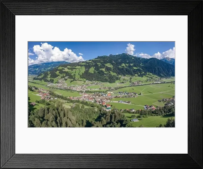 Framed Print : Aerial drone shot of Zillertal valley with clouds in Tyrol Austria summer Framed Print : Aerial drone shot of Zillertal valley with clouds in Tyrol Austria summer