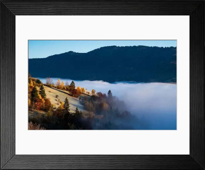 Framed Print : Sunrise over mountain hils covered with gray mist Framed Print : Sunrise over mountain hils covered with gray mist