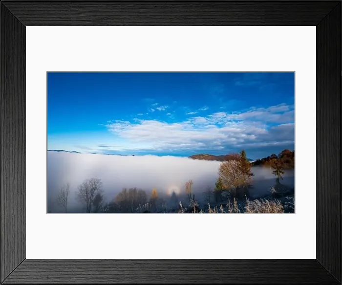 Framed Print : Sunrise over mountain hils covered with gray mist Framed Print : Sunrise over mountain hils covered with gray mist