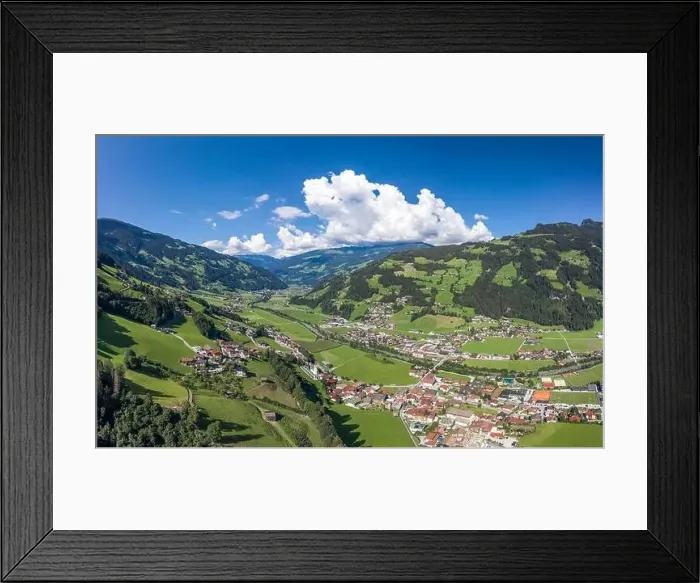 Framed Print : Aerial drone shot of Zillertal valley with clouds in Tyrol Austria summer Framed Print : Aerial drone shot of Zillertal valley with clouds in Tyrol Austria summer