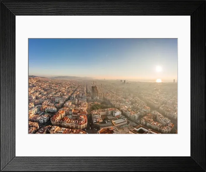 Framed Print : Aerial drone shot of sunrise over Barcelona city center in early morning Framed Print : Aerial drone shot of sunrise over Barcelona city center in early morning