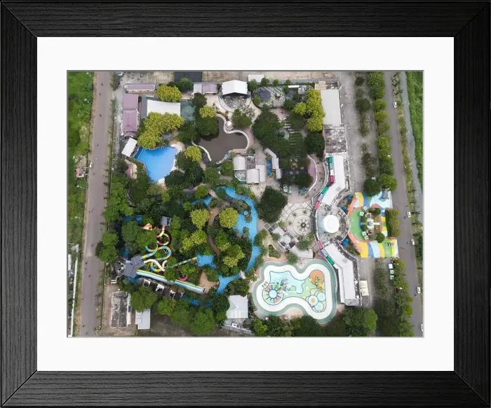Framed Print : Aerial view of Transera Waterpark Harapan Indah swimming pool at Bekasi, Indonesia. Bekasi, Indonesia February 2, 2021 Framed Print : Aerial view of Transera Waterpark Harapan Indah swimming pool at Bekasi, Indonesia. Bekasi, Indonesia February 2, 2021