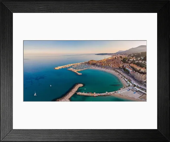 Framed Print : Sand beach beneath the colorful old town Menton on french Riviera, France. Drone aerial view over Menton France Europe Framed Print : Sand beach beneath the colorful old town Menton on french Riviera, France. Drone aerial view over Menton France Europe