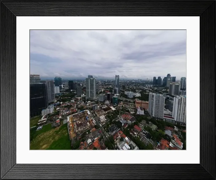 Framed Print : Aerial view of highway intersection and buildings in the city of Jakarta and noise cloud with Jakarta cityscape Framed Print : Aerial view of highway intersection and buildings in the city of Jakarta and noise cloud with Jakarta cityscape