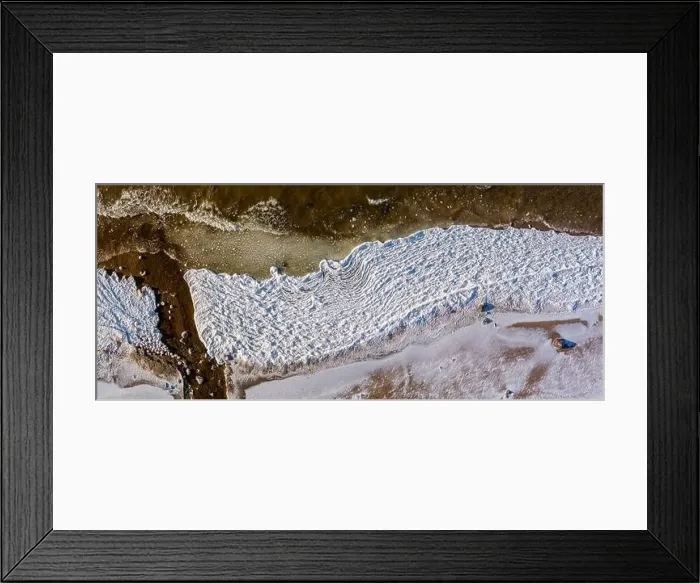 Framed Print : Aerial view over partialy frozen sea with white ice texture Framed Print : Aerial view over partialy frozen sea with white ice texture