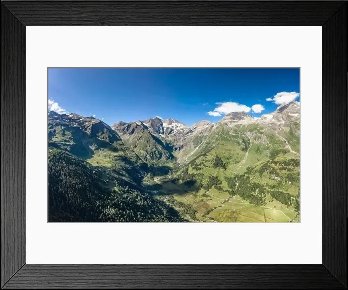 Framed Print : Aerial drone shot of Grossglockner mountain range valley in summer in Austria Framed Print : Aerial drone shot of Grossglockner mountain range valley in summer in Austria
