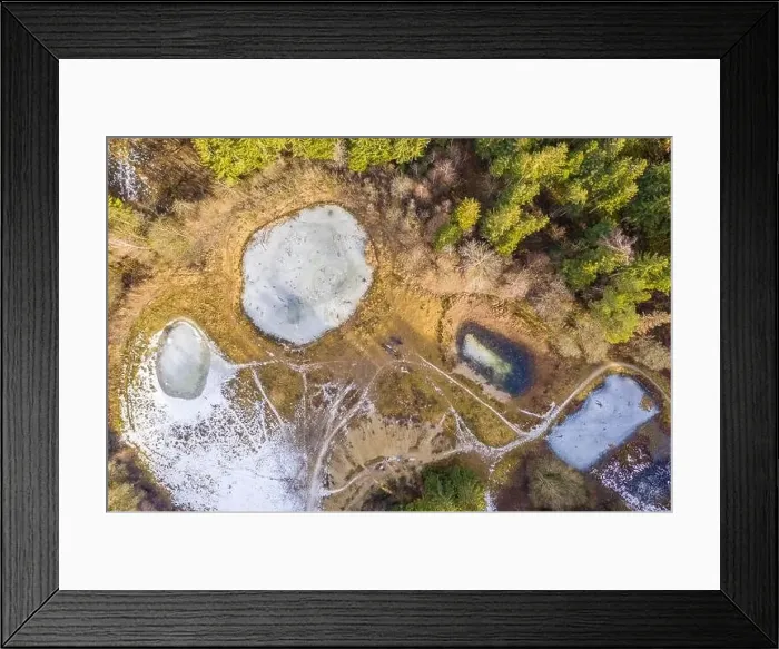 Framed Print : Drone top view of frozen lakes covered with ice at the winter season Framed Print : Drone top view of frozen lakes covered with ice at the winter season