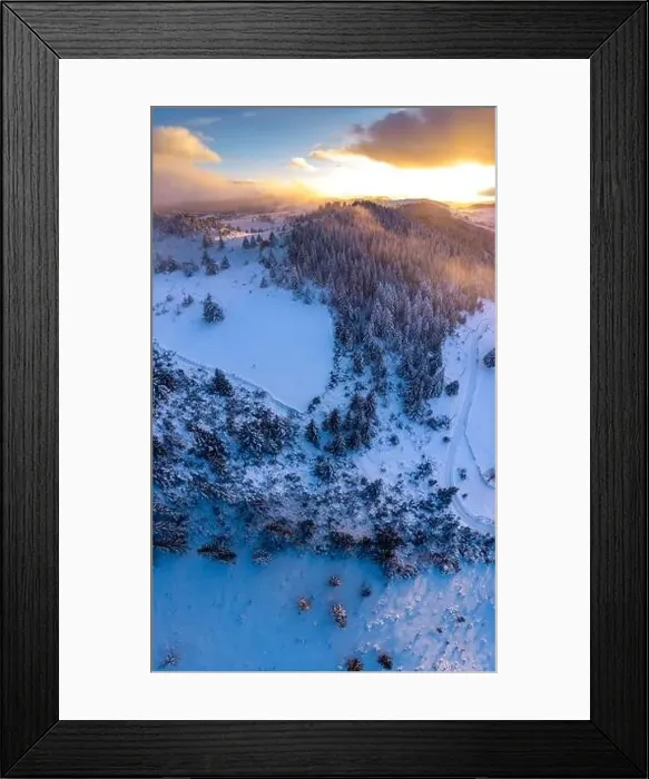 Framed Print : Rolling Clouds At Dense Spruce Coniferous Forest On Snowy White Hill Slope In Winter During Sunset Framed Print : Rolling Clouds At Dense Spruce Coniferous Forest On Snowy White Hill Slope In Winter During Sunset