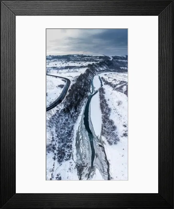 Framed Print : Coniferous Forest On Mountainous Landscape Densely Covered With Fresh Snow During Winter. - Aerial top-down Drone Shot Framed Print : Coniferous Forest On Mountainous Landscape Densely Covered With Fresh Snow During Winter. - Aerial top-down Drone Shot