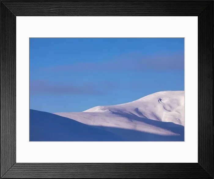 Framed Print : Mountain winter landscape. Colored dawn over the snow-capped mountains. Drone view Framed Print : Mountain winter landscape. Colored dawn over the snow-capped mountains. Drone view
