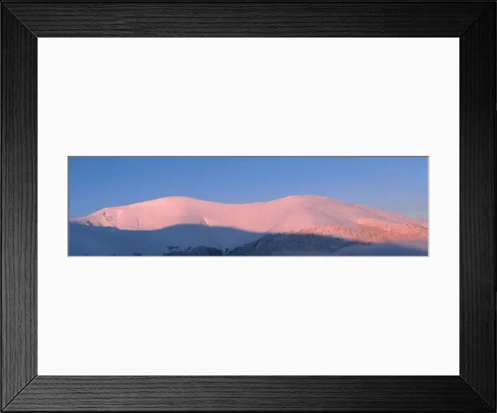 Framed Print : Mountain winter landscape. Colored dawn over the snow-capped mountains. Drone view Framed Print : Mountain winter landscape. Colored dawn over the snow-capped mountains. Drone view