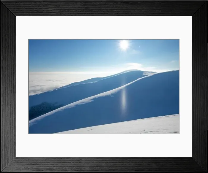 Framed Print : Mountain winter landscape. Colored dawn over the snow-capped mountains. Drone view Framed Print : Mountain winter landscape. Colored dawn over the snow-capped mountains. Drone view