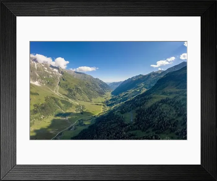 Framed Print : Aerial drone shot of Grossglockner mountain range valley in summer in Austria Framed Print : Aerial drone shot of Grossglockner mountain range valley in summer in Austria