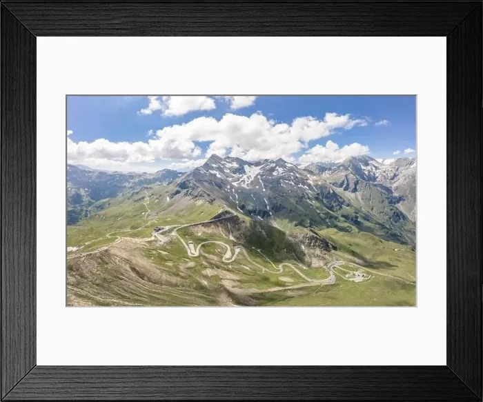 Framed Print : Aerial drone shot of serpentine high alpine road Taxenbacher Fusch below Edelweissspitze in Grossglockner in Austria Framed Print : Aerial drone shot of serpentine high alpine road Taxenbacher Fusch below Edelweissspitze in Grossglockner in Austria