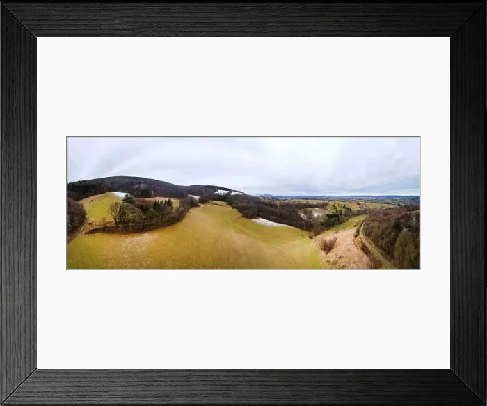 Framed Print : aerial drone panorama of green hills with a little snow in Lower Austria at the edge of the Vienna Woods near Vienna Framed Print : aerial drone panorama of green hills with a little snow in Lower Austria at the edge of the Vienna Woods near Vienna