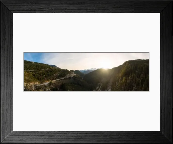 Framed Print : Aerial drone view of Sea to Sky Highway during a bright winter sunset Framed Print : Aerial drone view of Sea to Sky Highway during a bright winter sunset