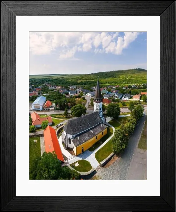 Framed Print : Aerial photo about the Church of the Assumption in Gyongyospata Hungary Framed Print : Aerial photo about the Church of the Assumption in Gyongyospata Hungary