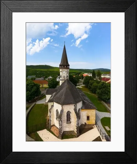 Framed Print : Aerial photo about the Church of the Assumption in Gyongyospata Hungary Framed Print : Aerial photo about the Church of the Assumption in Gyongyospata Hungary