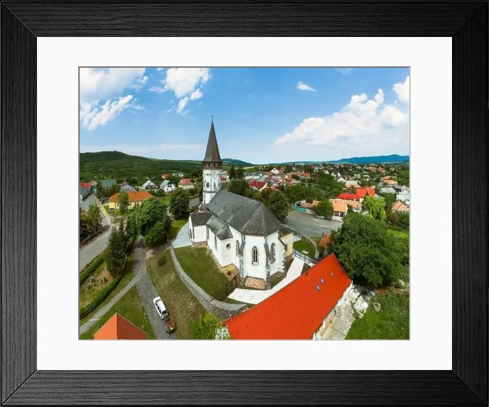 Framed Print : Aerial photo about the Church of the Assumption in Gyongyospata Hungary Framed Print : Aerial photo about the Church of the Assumption in Gyongyospata Hungary