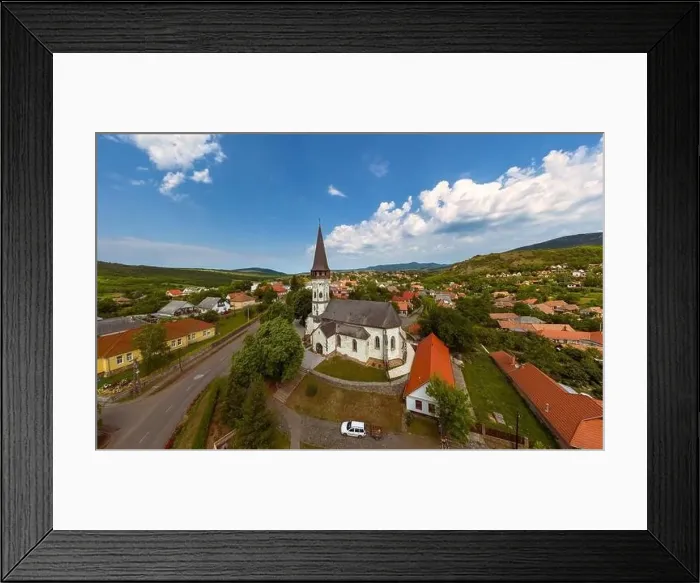 Framed Print : Aerial photo about the Church of the Assumption in Gyongyospata Hungary Framed Print : Aerial photo about the Church of the Assumption in Gyongyospata Hungary