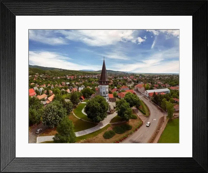 Framed Print : Aerial photo about the Church of the Assumption in Gyongyospata Hungary Framed Print : Aerial photo about the Church of the Assumption in Gyongyospata Hungary