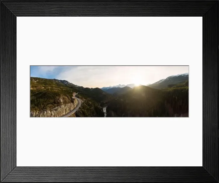 Framed Print : Aerial drone view of Sea to Sky Highway during a bright winter sunset Framed Print : Aerial drone view of Sea to Sky Highway during a bright winter sunset