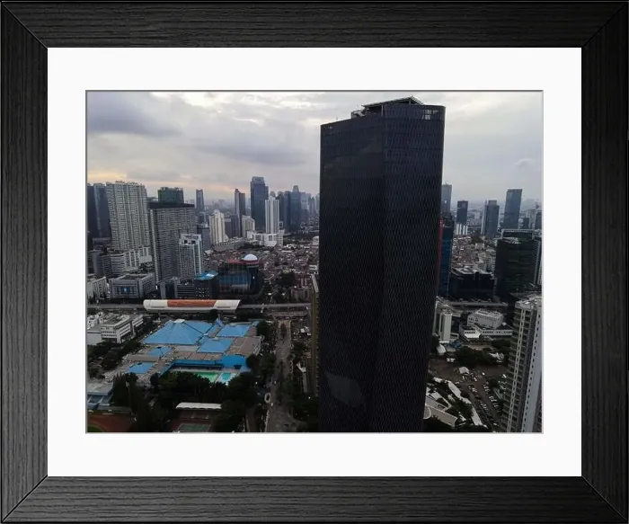 Framed Print : Aerial view of highway intersection and buildings in the city of Jakarta and noise cloud with Jakarta cityscape Framed Print : Aerial view of highway intersection and buildings in the city of Jakarta and noise cloud with Jakarta cityscape