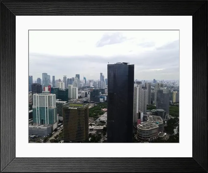 Framed Print : Aerial view of highway intersection and buildings in the city of Jakarta and noise cloud with Jakarta cityscape Framed Print : Aerial view of highway intersection and buildings in the city of Jakarta and noise cloud with Jakarta cityscape
