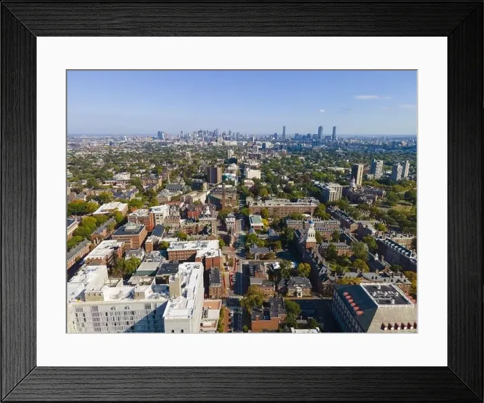 Framed Print : Aerial view of historic city center of Cambridge on Mt Auburn Street with Boston modern city skyline at the background Framed Print : Aerial view of historic city center of Cambridge on Mt Auburn Street with Boston modern city skyline at the background