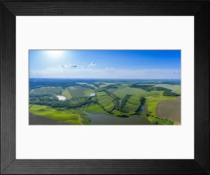 Framed Print : Many homesteads and identical houses. Aerial view