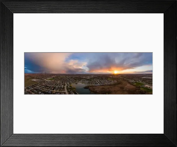 Framed Print : A high, aerial drone view of storm clouds at sunset with an Illinois neighborhood in the foreground Framed Print : A high, aerial drone view of storm clouds at sunset with an Illinois neighborhood in the foreground