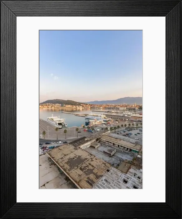 Framed Print : Split, Croatia - Aug 14, 2020: Aerial drone shot of ferry port at old town port in sunrise hour Framed Print : Split, Croatia - Aug 14, 2020: Aerial drone shot of ferry port at old town port in sunrise hour