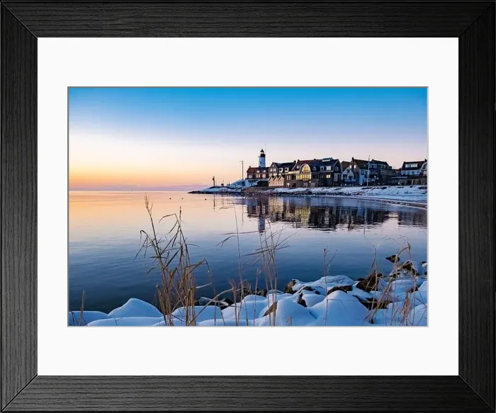 Framed Print : Urk Netherlands lighthouse during winter with snow covered coastline Framed Print : Urk Netherlands lighthouse during winter with snow covered coastline