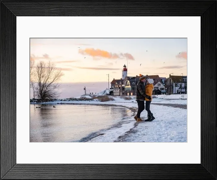 Framed Print : Urk Netherlands lighthouse during winter with snow covered coastline Framed Print : Urk Netherlands lighthouse during winter with snow covered coastline