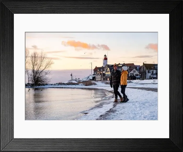 Framed Print : Urk Netherlands lighthouse during winter with snow covered coastline Framed Print : Urk Netherlands lighthouse during winter with snow covered coastline