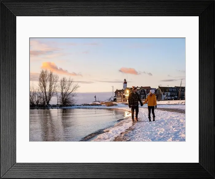 Framed Print : Urk Netherlands lighthouse during winter with snow covered coastline Framed Print : Urk Netherlands lighthouse during winter with snow covered coastline