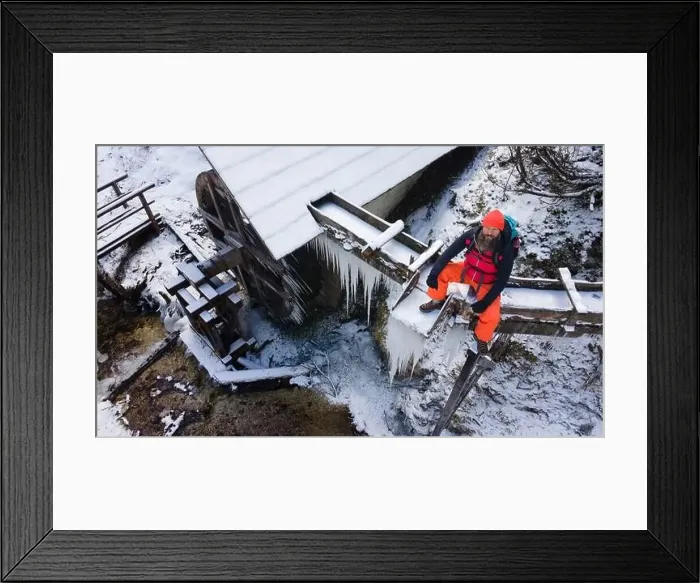 Framed Print : aerial drone shoot of cool male Hiker with beard