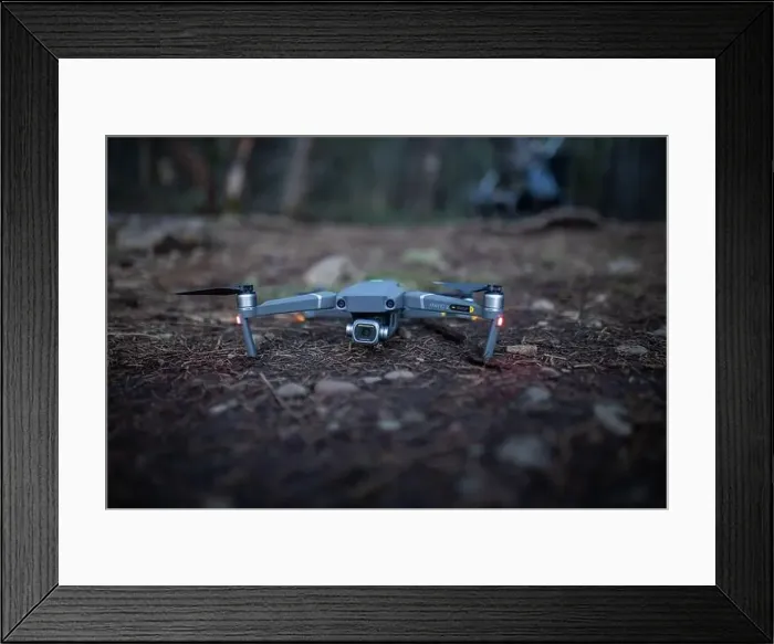 Framed Print : Drone on the dirt ground with blurry background Framed Print : Drone on the dirt ground with blurry background