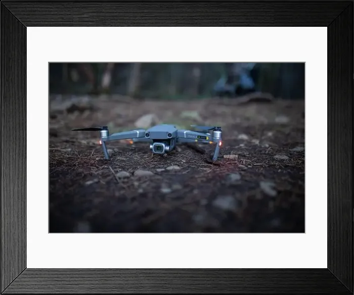 Framed Print : Drone on the dirt ground with blurry background Framed Print : Drone on the dirt ground with blurry background