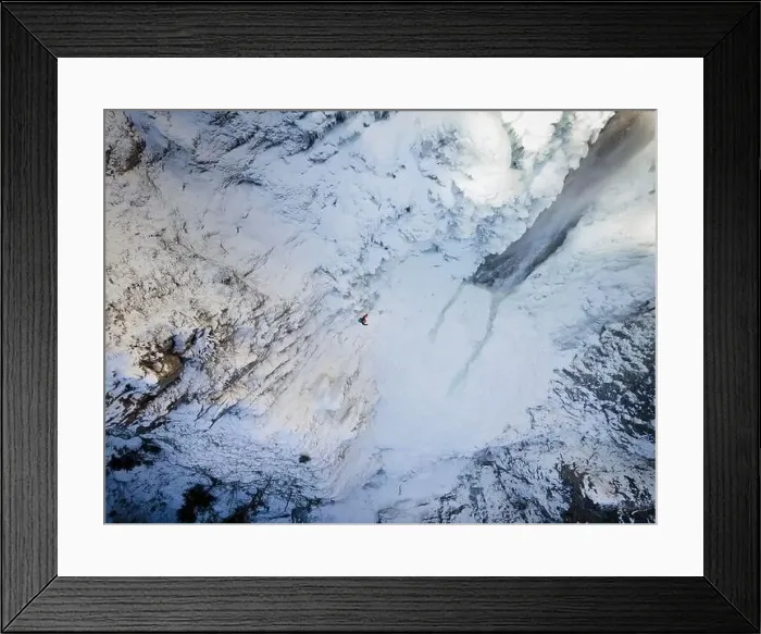 Framed Print : aerial drone shot of hiker with backpack Framed Print : aerial drone shot of hiker with backpack