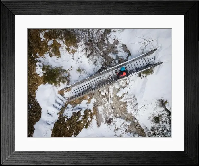Framed Print : aerial drone shot of hiker with backpack Framed Print : aerial drone shot of hiker with backpack