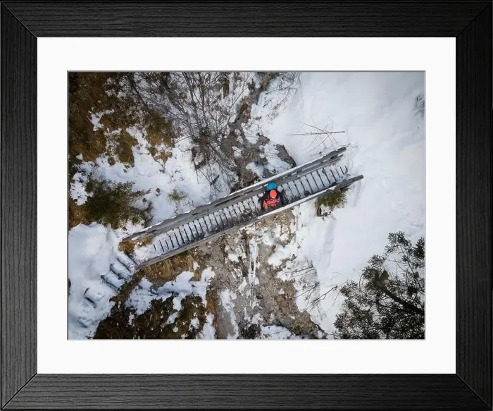 Framed Print : aerial drone shot of hiker with backpack Framed Print : aerial drone shot of hiker with backpack
