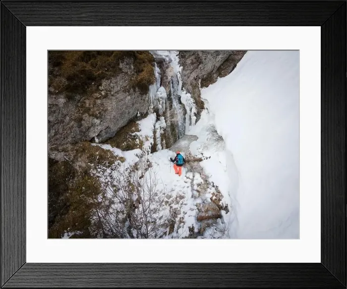 Framed Print : aerial drone shot of hiker with backpack Framed Print : aerial drone shot of hiker with backpack