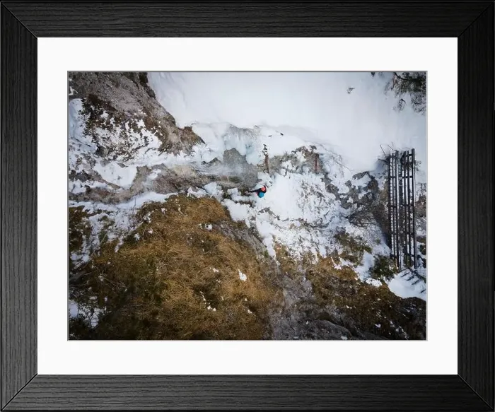 Framed Print : aerial drone shot of hiker with backpack Framed Print : aerial drone shot of hiker with backpack
