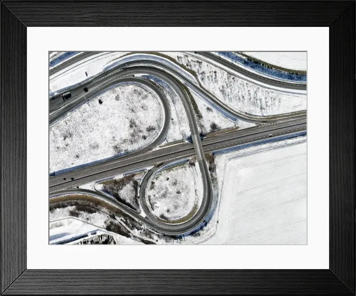 Framed Print : aerial drone view of a highway interchange, winter landscape Framed Print : aerial drone view of a highway interchange, winter landscape
